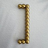 Pearl Brass Handle